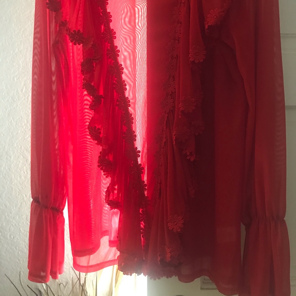 Ups and downs blouse color; red,  ruffles